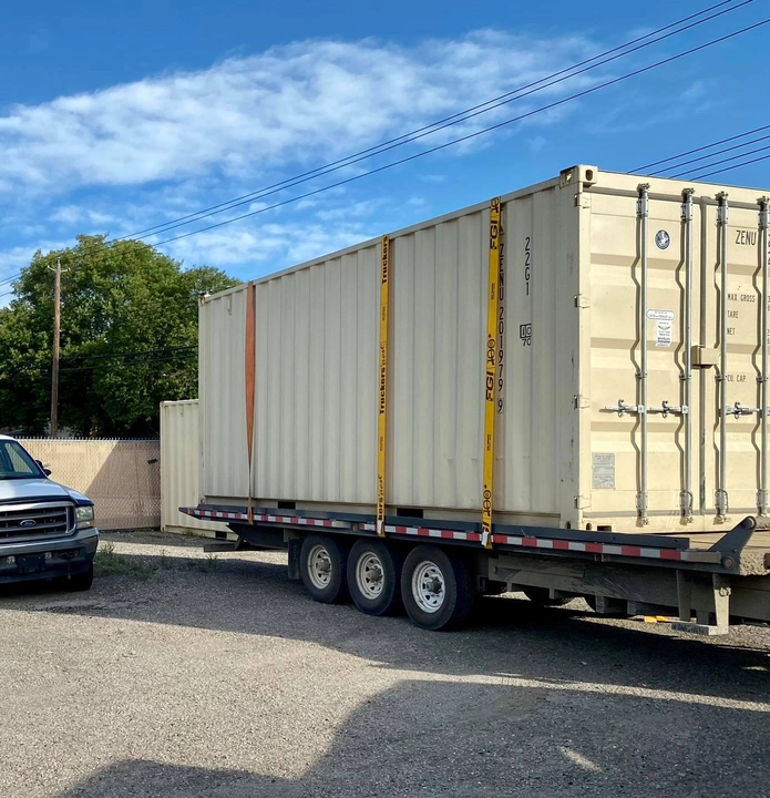 Shipping container delivery and placement equipment